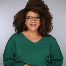 Headshot of Mandi Woodruff-Santos, Executive Producer/Host
